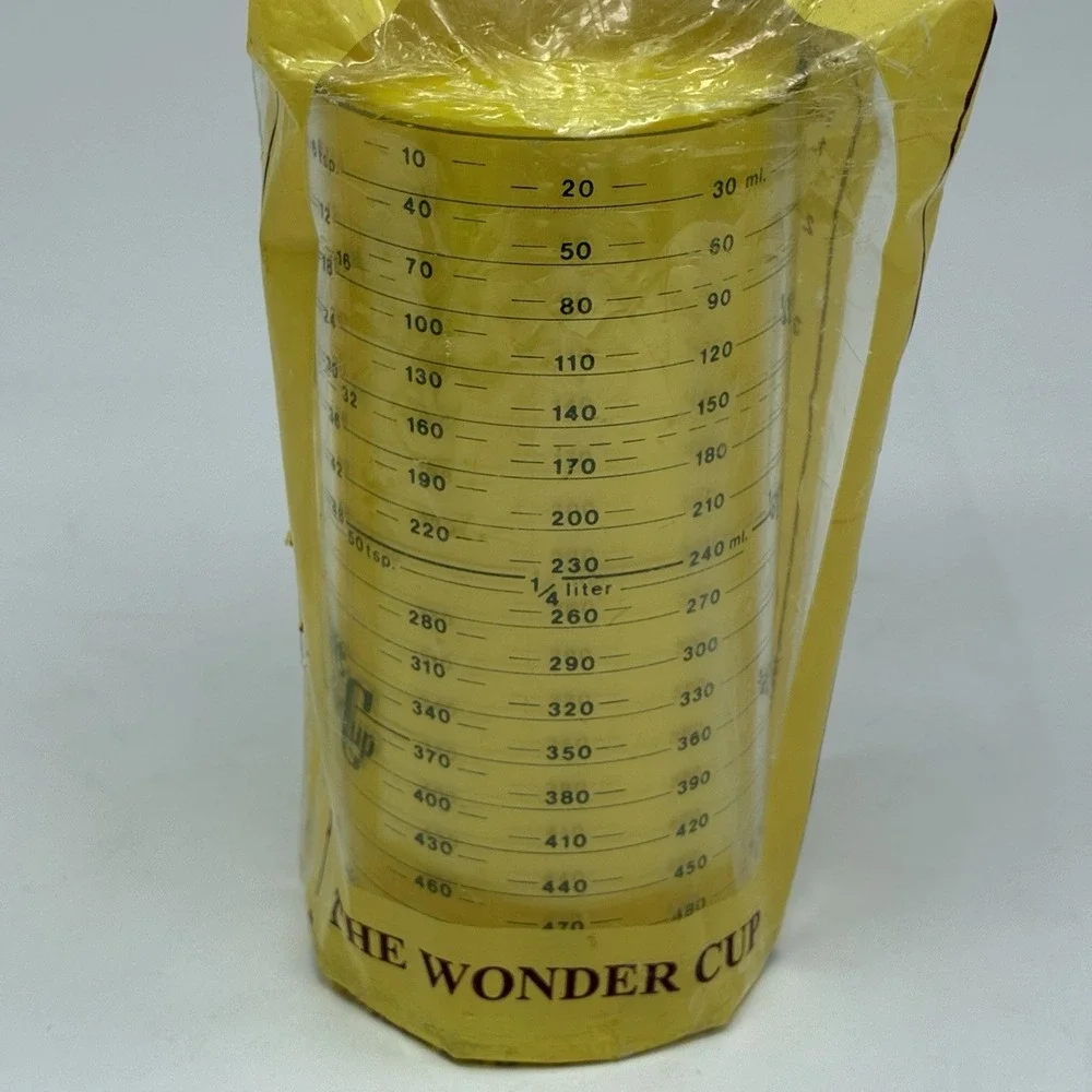 The Pampered Chef Wonder Cup Adjustable Measuring Cup Liquid & Solids #2220 New